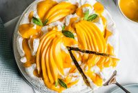 Coconut Meringue Cake with Mango Purée and Fresh Mango Slices
