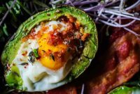 Creamy Avocado Baked Eggs with Crispy Herb Topping