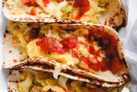 Migas Breakfast Tacos: Crispy Tortillas with Eggs, Salsa & Cheese