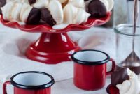 Meringue Kisses with Ice Cream and Chocolate Sauce