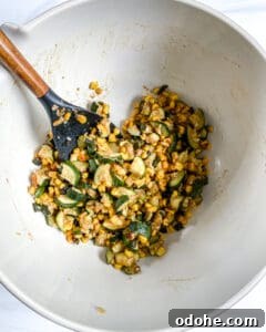 various ingredients in a white bowl against a white background