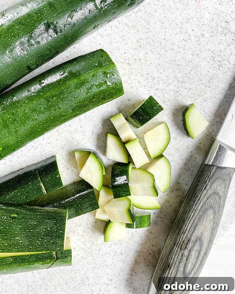 sliced cucumber against a white background
