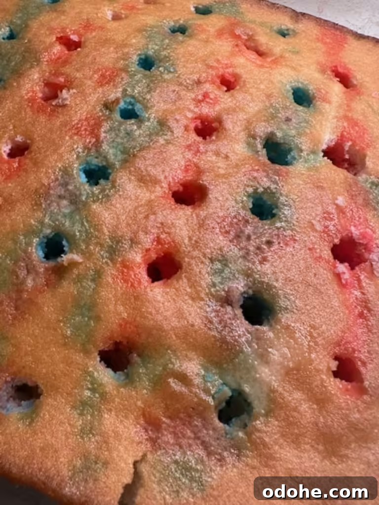Festive Summer Jello Poke Cake Recipe for Bright Celebrations 4 img 10284 3