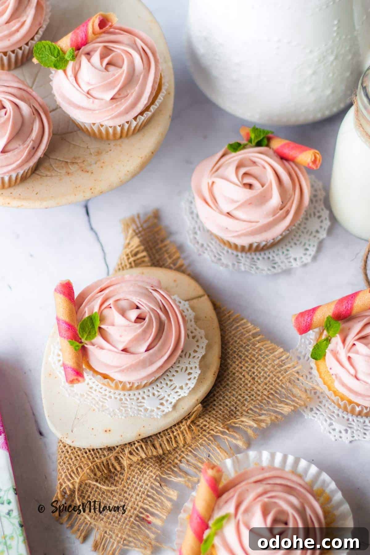 Strawberry Cream Cheese Cake Filling Recipe for Moist Layer Cakes 8 overhead shot of eggless vanilla cupcakes frosted with strawberry filling to show the shape from above
