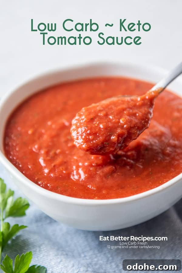 Low Carb Keto Tomato Sauce in a bowl with a spoon