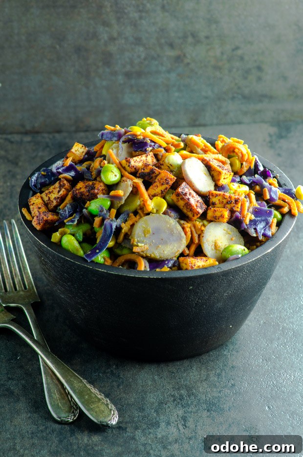 Sweet Potato Noodle Stir-Fry with Creamy Peanut Sauce 5 Spiralized sweet potato noodles, purple cabbage, edamame, corn, water chestnuts and tofu in a creamy peanut sauce.