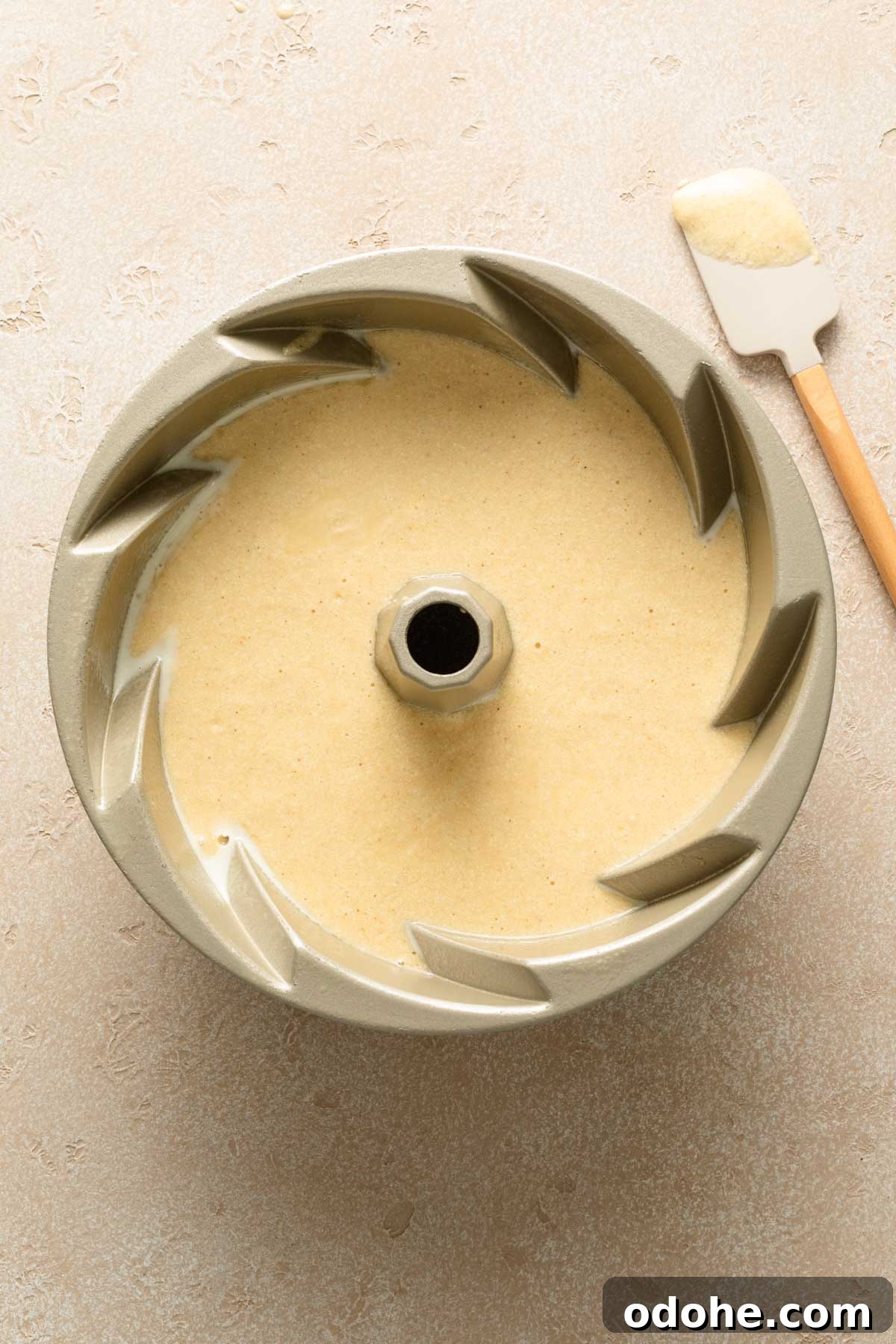 Decadent Eggnog Bundt Cake Recipe for Holiday Gatherings 4 Eggnog cake batter in a bundt pan.