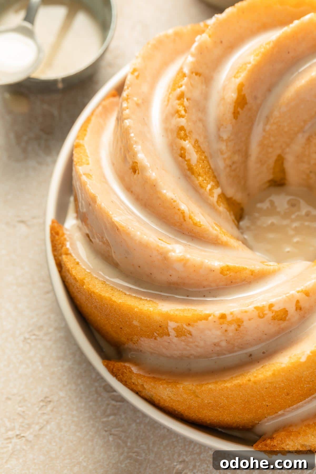 Decadent Eggnog Bundt Cake Recipe for Holiday Gatherings 6 Close up view of glaze on eggnog bundt cake.