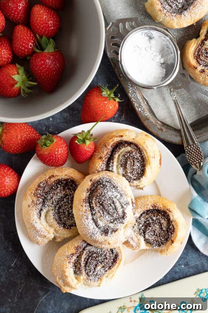 Nutella swirls on a plate.