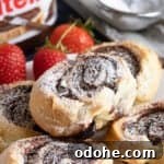 Nutella puff pastry swirls on a plate.