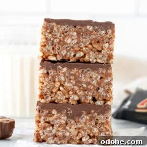 Stack of three Mars Bar Slice squares, one on top of another