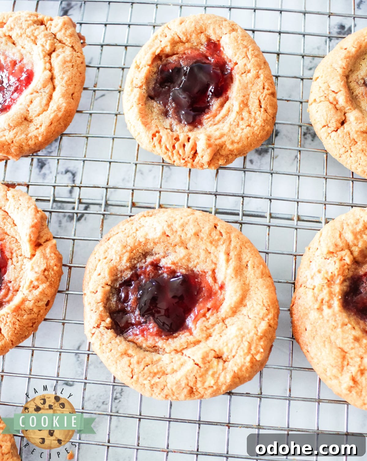 Peanut Butter & Jelly Cookie Recipe — Classic Sandwich Twist 4 3-Ingredient peanut butter cookies with jelly.