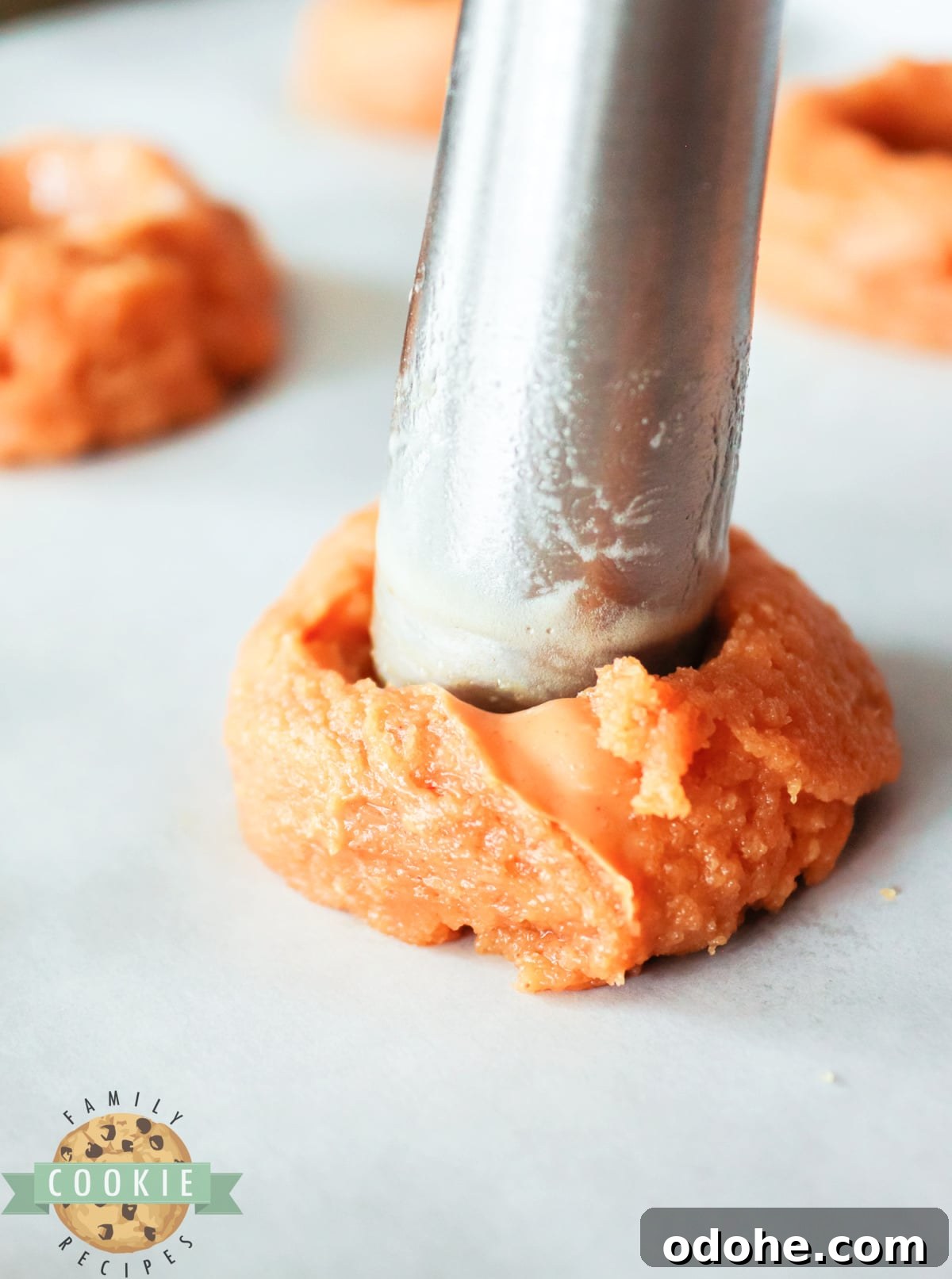 Peanut Butter & Jelly Cookie Recipe — Classic Sandwich Twist 7 Making indentation in peanut butter cookies.