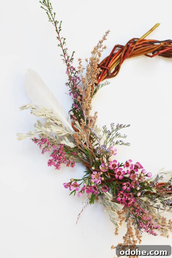 Dried flowers on a willow wreath in the snow - frequently bought
