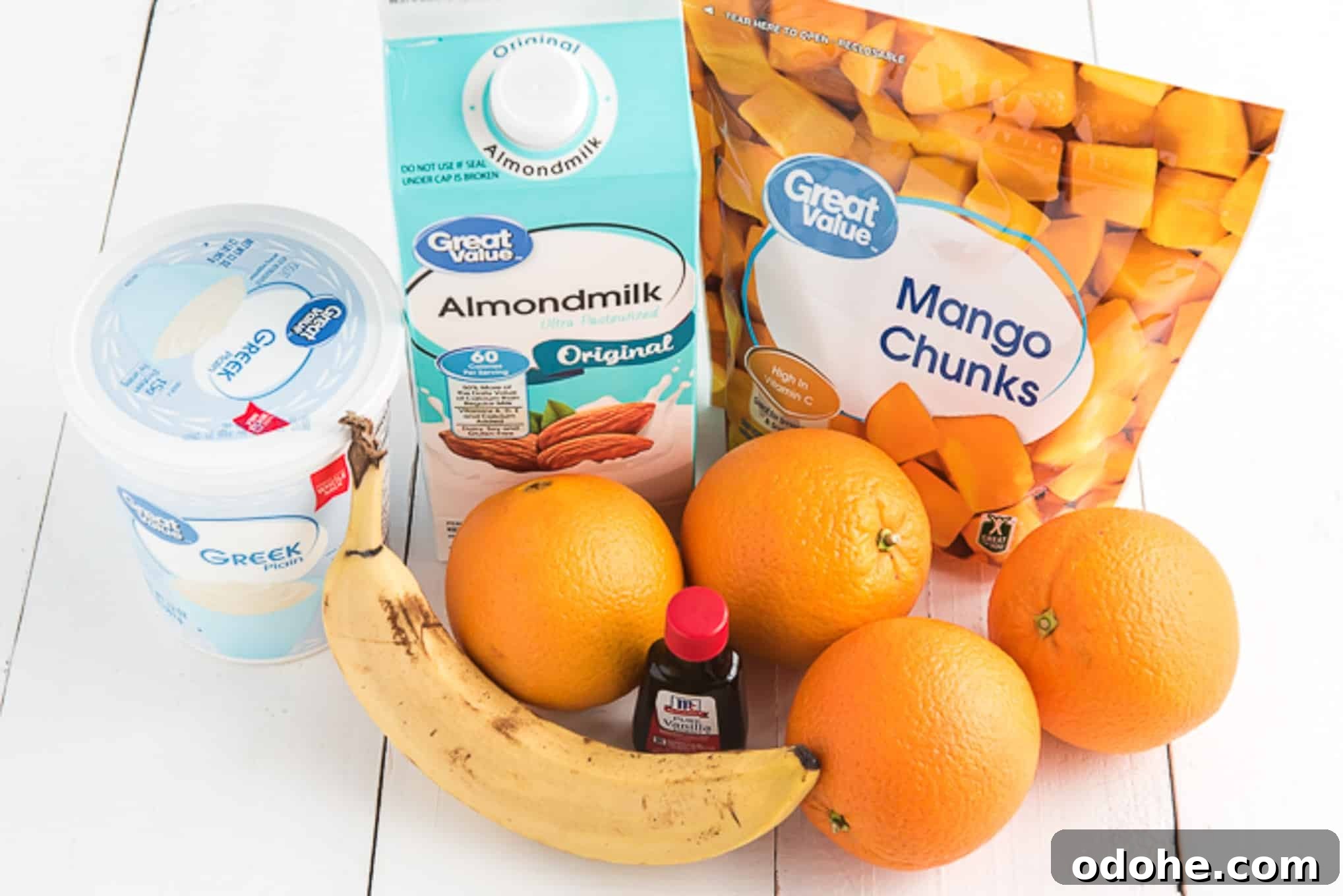Energizing Orange Smoothie Recipe for Vitamin C Boost 3 Ingredients gathered together for orange smoothie.