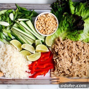 Lettuce wrap ingredients sprawled over platter.