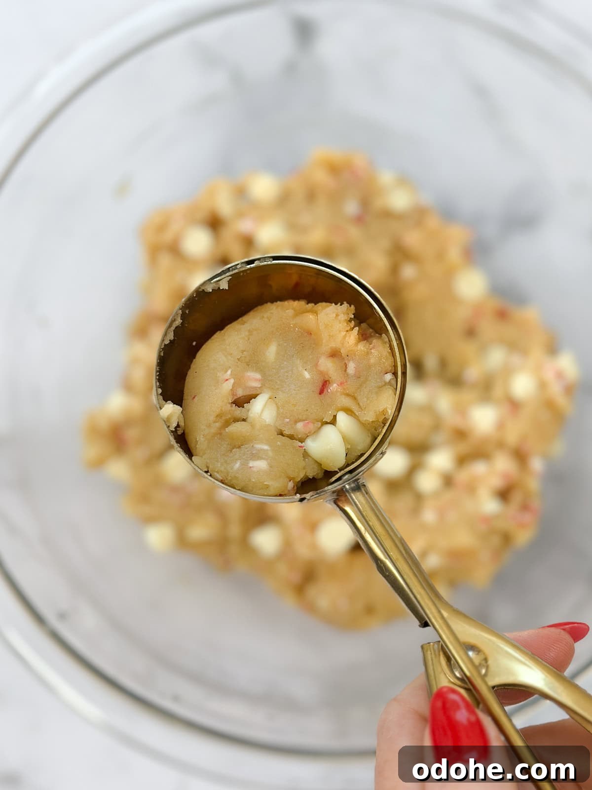 Peppermint White Chocolate Brookie Cookies Recipe 11 peppermint cookie dough in the scoop.