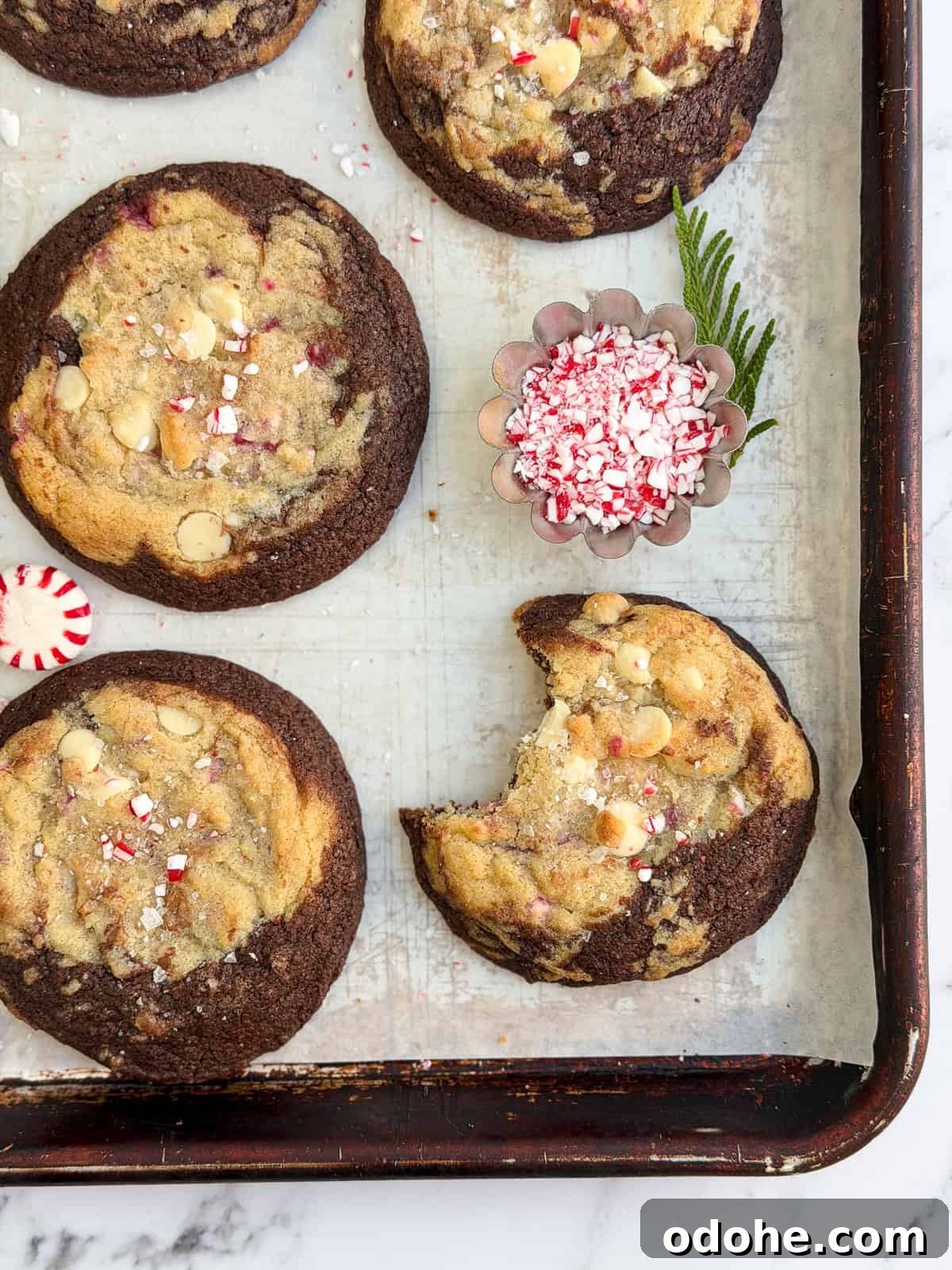 Peppermint White Chocolate Brookie Cookies Recipe 15 a peppermint white chocolate brookies cookie with a big bite missing.