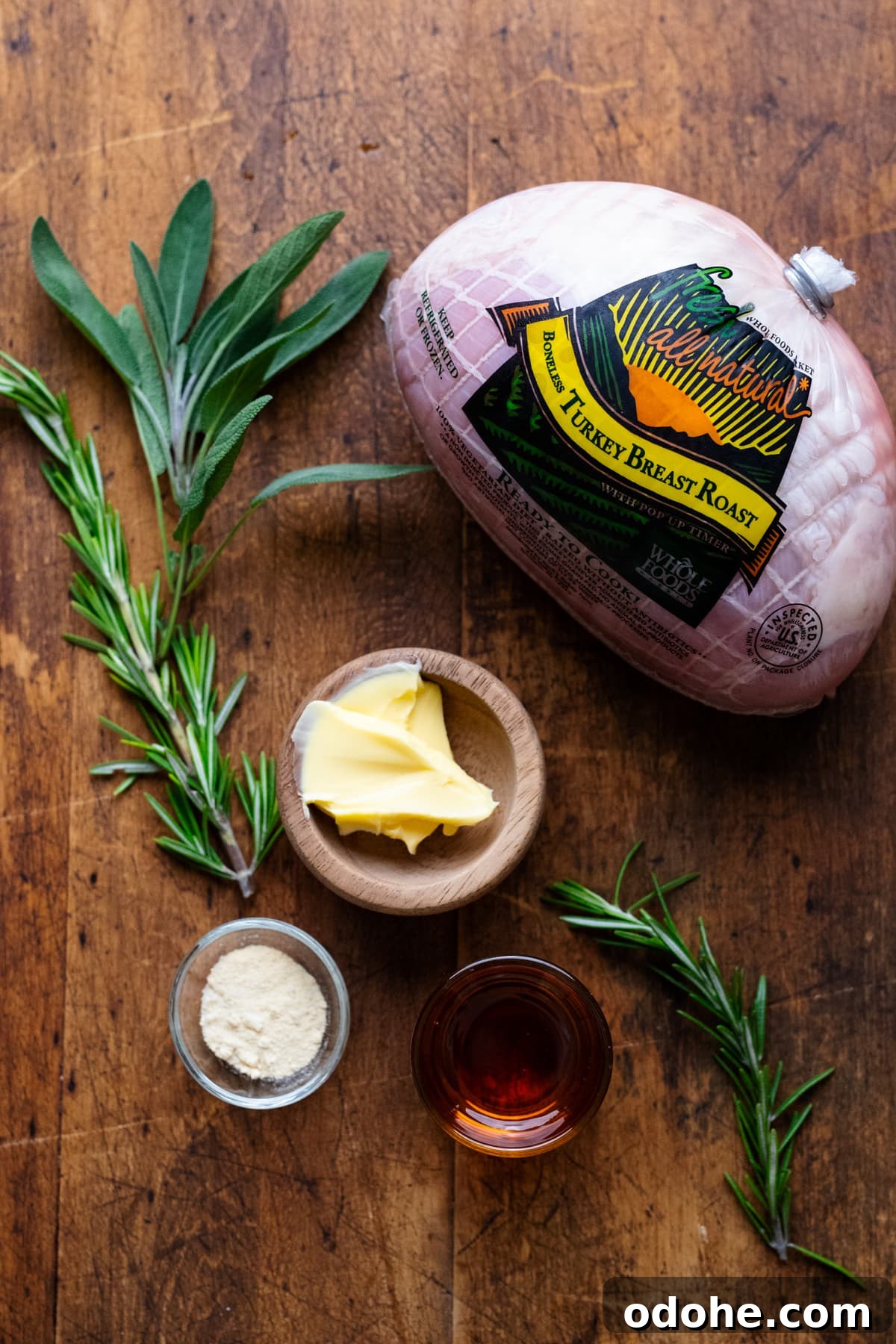 Maple Herb Turkey Breast in the Air Fryer: Juicy, Flavorful Roast 3 Ingredients for air fryer turkey breast arranged on a wooden board.