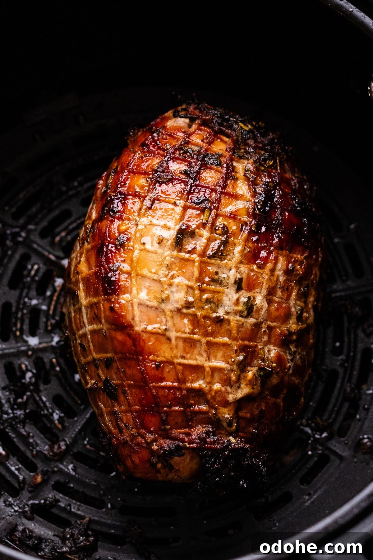 Maple Herb Turkey Breast in the Air Fryer: Juicy, Flavorful Roast 9 A roasted turkey breast in an air fryer.