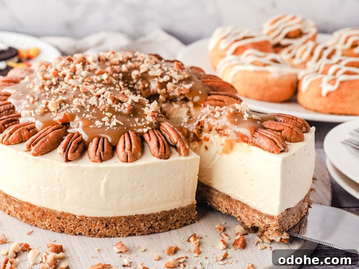No-Bake Cheesecake Recipes: Simple, No-Oven Dessert Ideas 5 Serving caramel pecan cheesecake, with Thanksgiving desserts in the background.