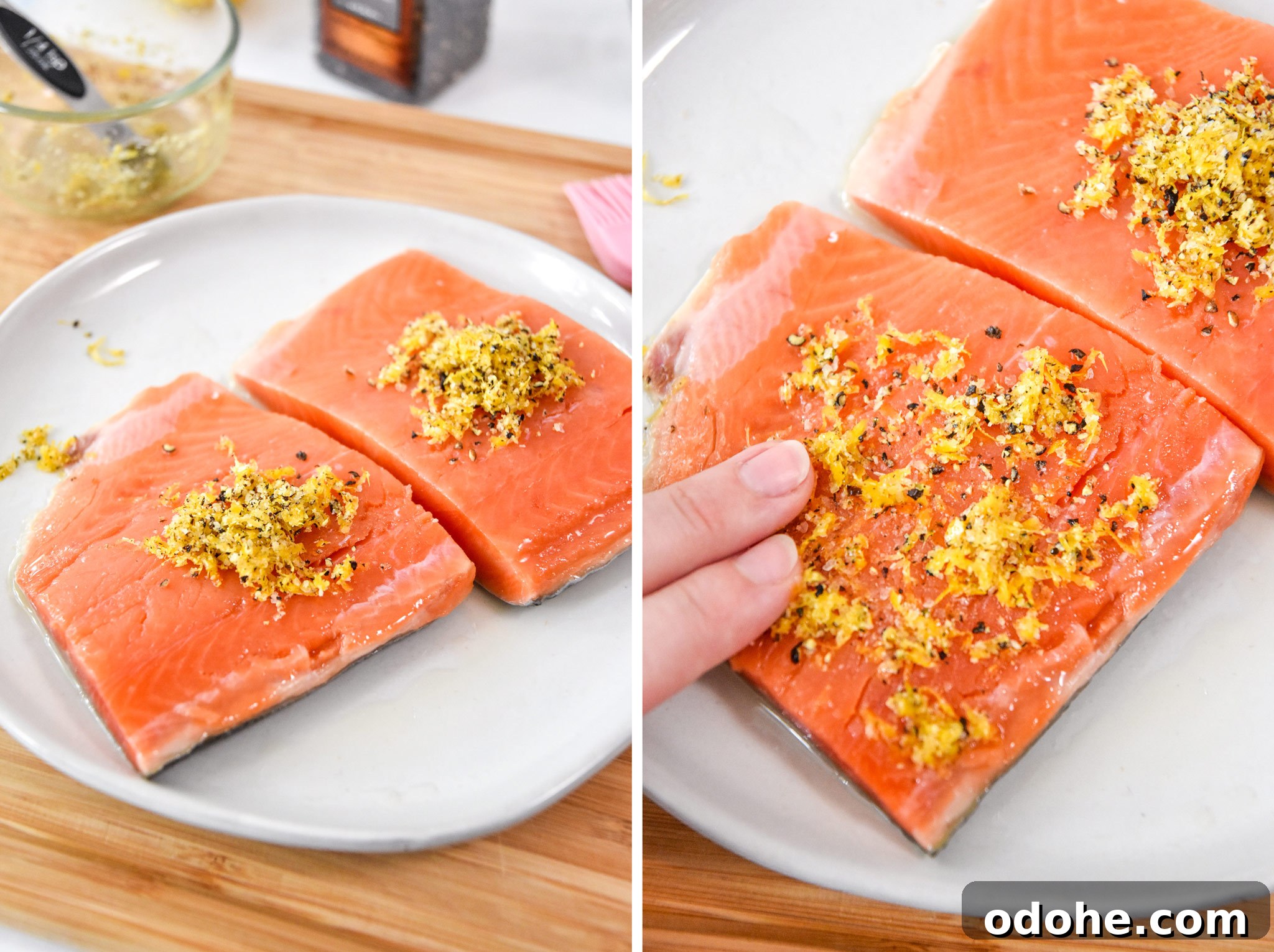 spreading the lemon pepper seasoning on the salmon fillets.