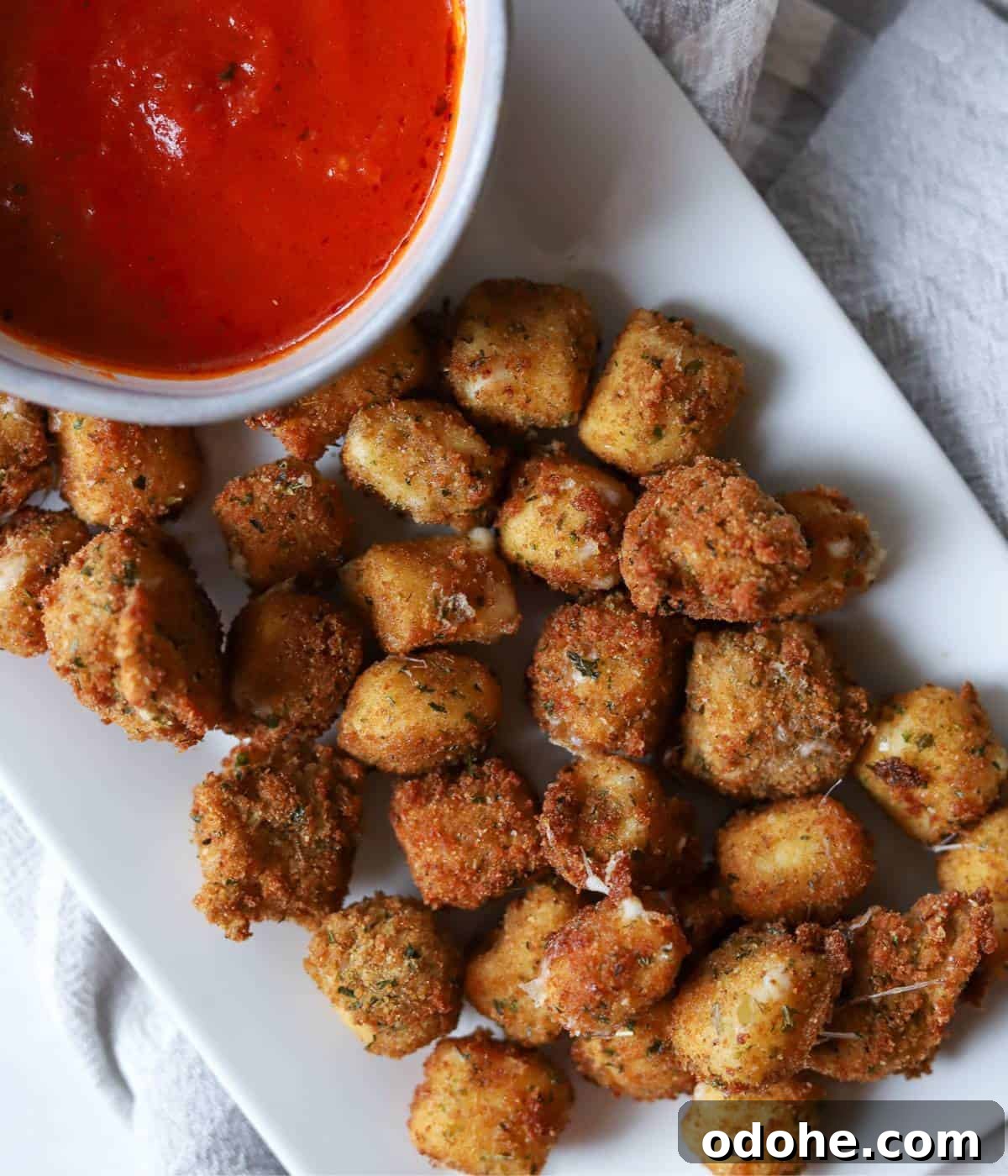 Crispy Fried Mozzarella Balls with Marinara Dip 11 Fried cheese balls with marinara sauce.