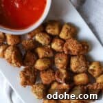 Fried cheese balls with marinara sauce.