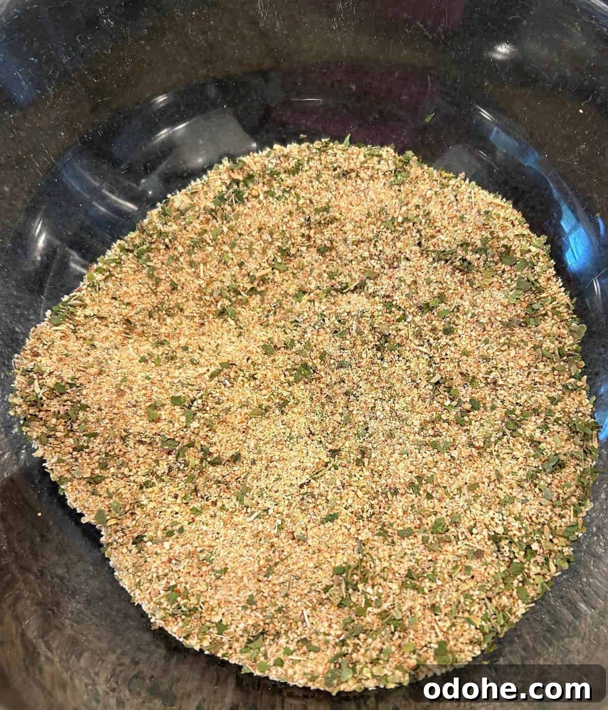 Crispy Fried Mozzarella Balls with Marinara Dip 5 Breadcrumb mixture in bowl.