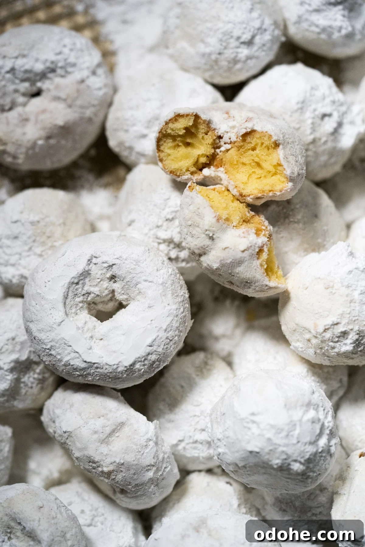 Keto Powdered Sugar Donuts — 1g Net Carb Recipe 2 Closeup keto powdered sugar donut showing its tender texture