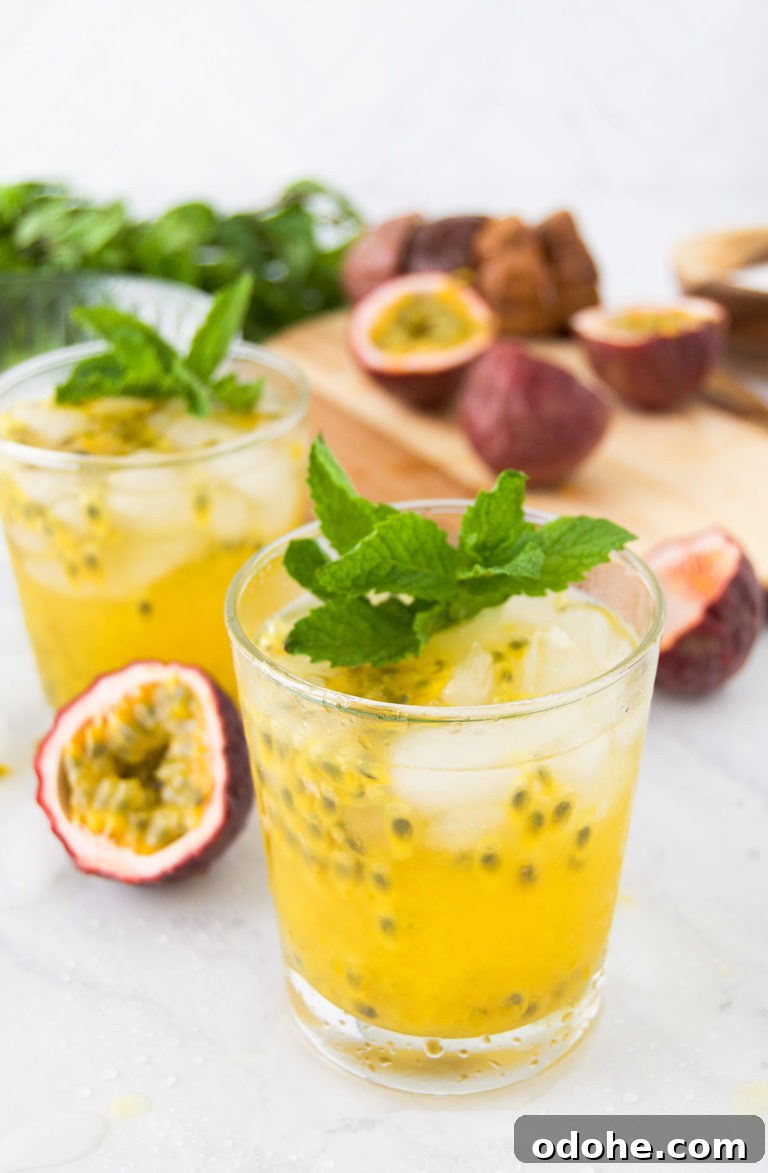 Two glasses of Caipirinha de Maracuja with passion fruit