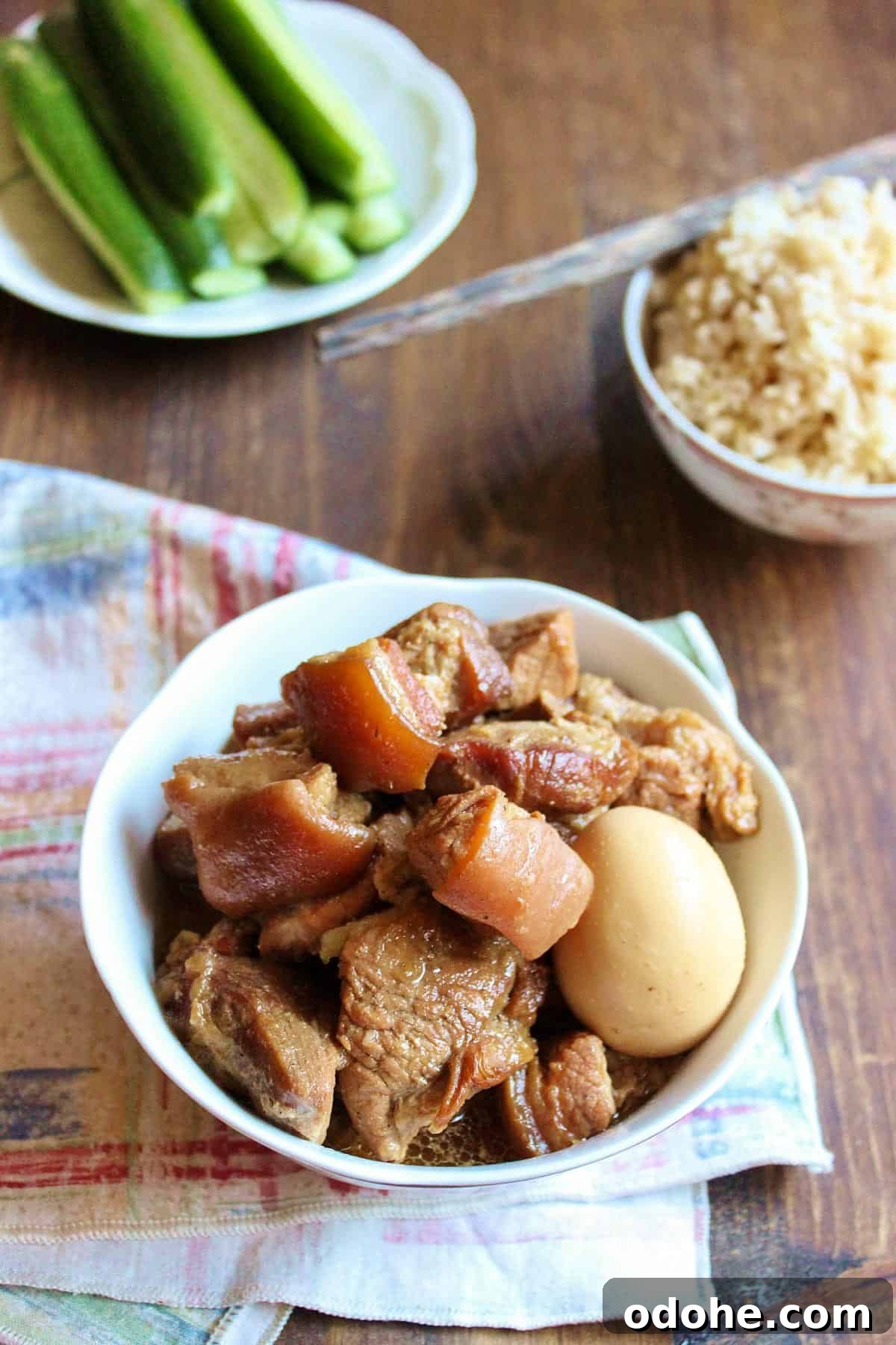 Vietnamese Braised Pork and Eggs (Thịt Kho Trứng) 5 Vietnamese Braised Pork (Thịt kho) served with rice and cucumber.