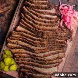 Smoking a Brisket Flat: Step-by-Step Guide for Tender Results 10 Slices of smoked brisket flat on a cutting board