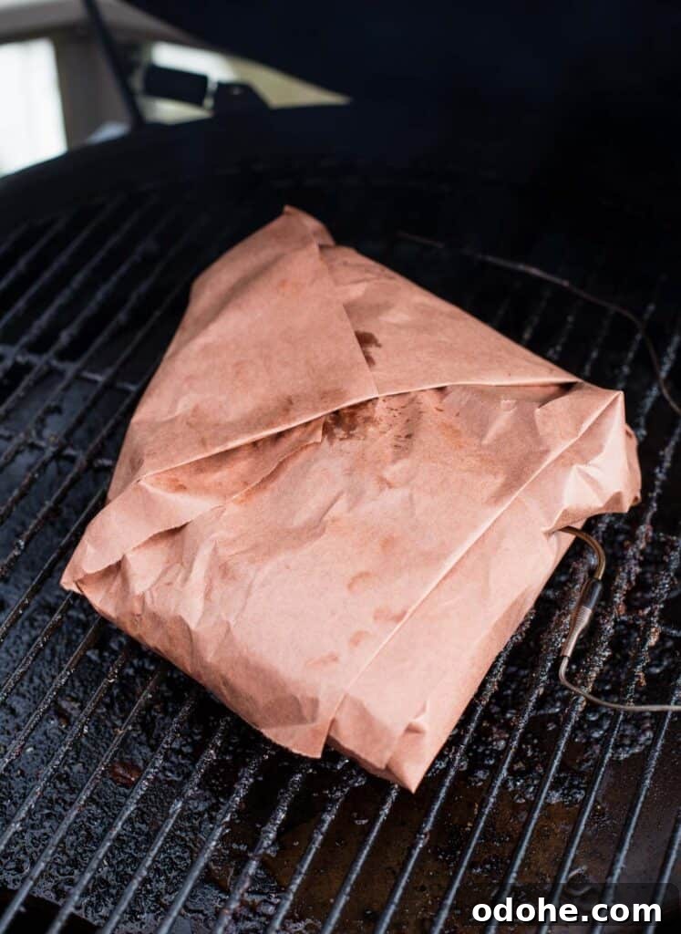 Smoking a Brisket Flat: Step-by-Step Guide for Tender Results 7 wrapped brisket flat on the smoker