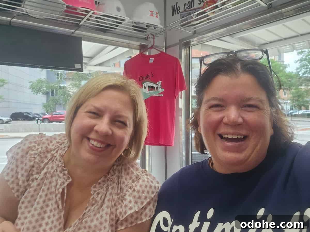 Tammilee and Kim laughing in Cindy's Diner
