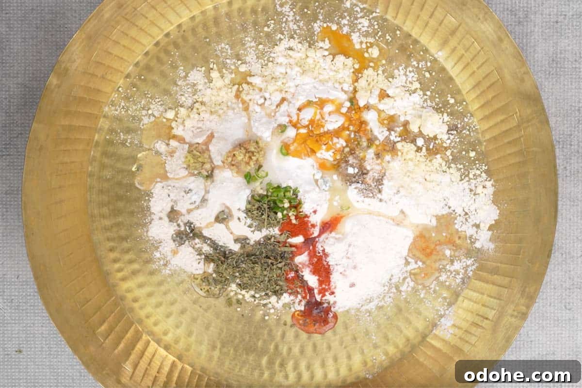 All the dough ingredients added to a large bowl.
