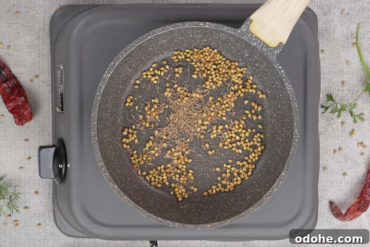 Roasted coriander and cumin seeds.