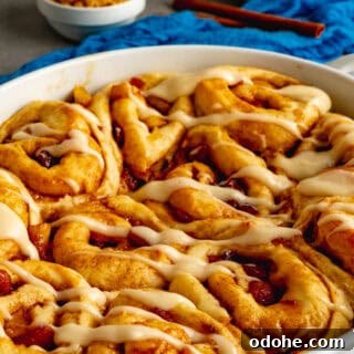 Apple Cider Cinnamon Rolls with Maple Glaze Recipe 5 A 9 inch oval baking dish with apple cider cinnamon rolls.