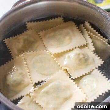 Fresh Spinach and Ricotta Ravioli Recipe for Homemade Pasta 15 Ravioli being boiled in water.
