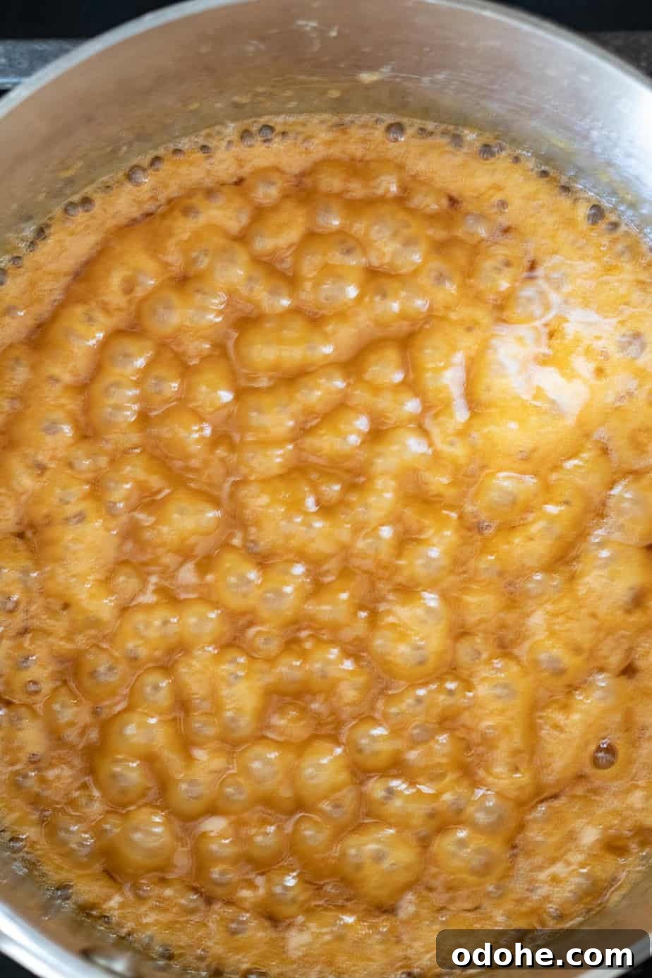 caramel bubbling in a saucepan