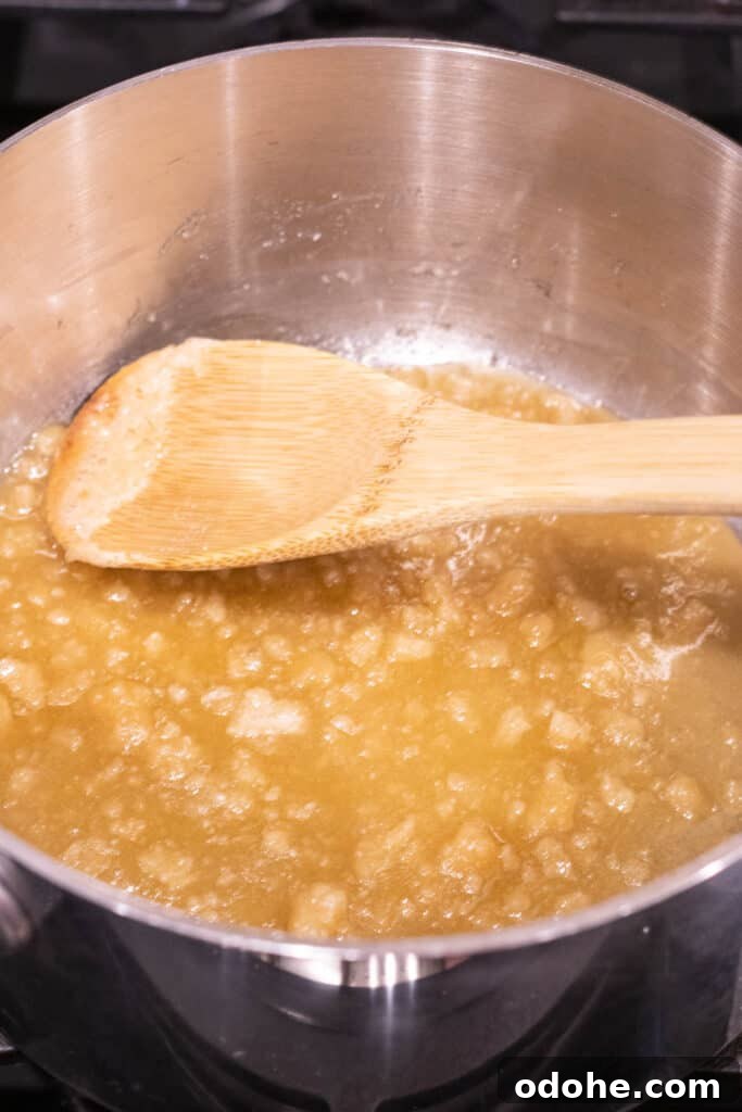 sugar turning brown and melting in saucepan