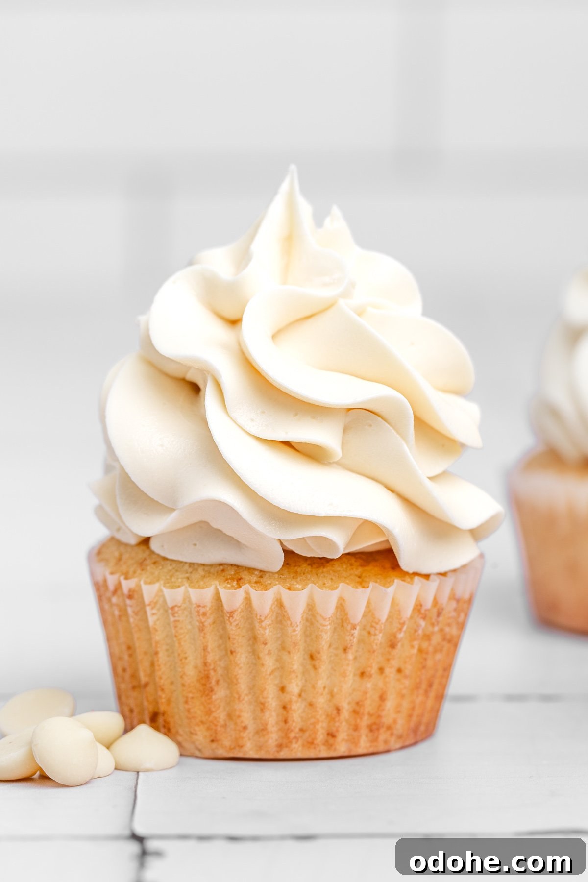 white chocolate buttercream frosting on cupcakes close up