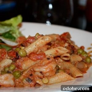 Creamy Shrimp Pasta with Tomatoes and Sweet Peas 2 Pasta with creamy shrimp, tomatoes and peas