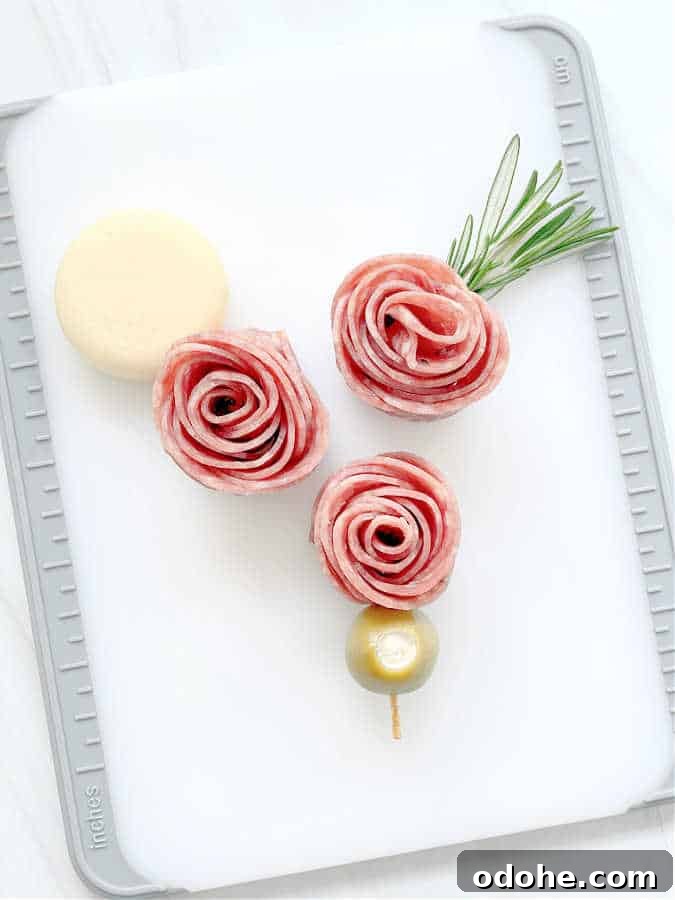 Create a Salami Rose: Step-by-Step Guide for Party Platters 8 salami rosebuds displayed on a cutting board