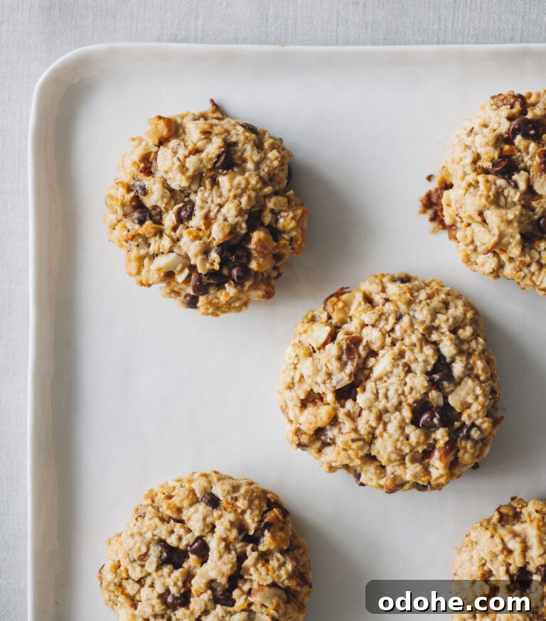 Tahini Chocolate Chip Cookies arranged on a baking sheet.