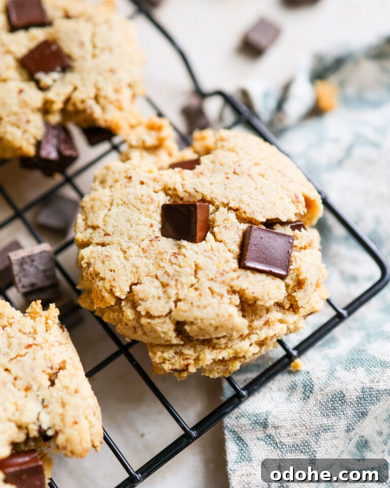 Almond Flour Chocolate Chip Cookie on a cooling rack.