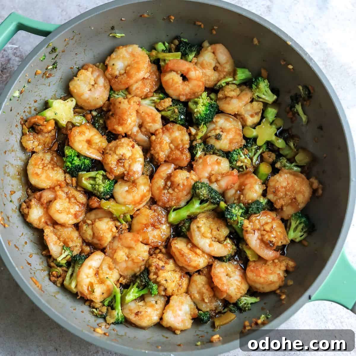 Mongolian Shrimp and Broccoli Stir-Fry Recipe 7 Grey skillet with Mongolian shrimp and broccoli.