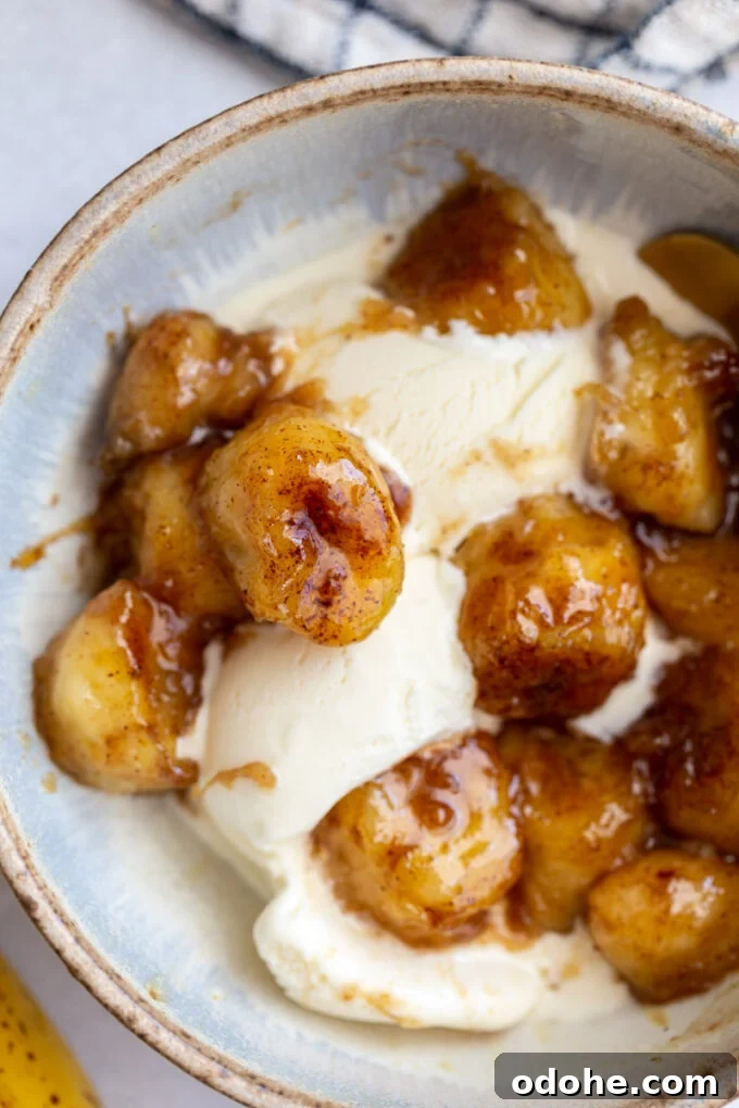 How to Make Perfect Caramelized Bananas for Desserts and Toppings 2 caramelized bananas served over vanilla ice cream