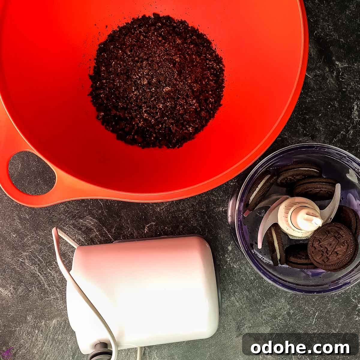 Creamy No-Bake Strawberry Cheesecake Recipe for Summer Serving 3 Crush the Oreo cookies using an electric chopper.