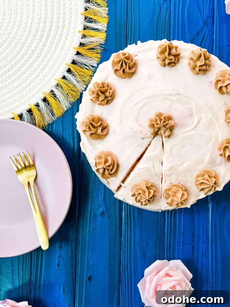 Creamy No-Bake Strawberry Cheesecake Recipe for Summer Serving 8 Beautifully decorated cake with chocolate cream cheese buttercream.